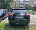 Чорний Опель Інсігнія, об'ємом двигуна 2 л та пробігом 243 тис. км за 7513 $, фото 2 на Automoto.ua