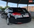 Чорний Опель Інсігнія, об'ємом двигуна 2 л та пробігом 253 тис. км за 8299 $, фото 44 на Automoto.ua