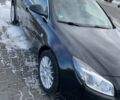Черный Опель Инсигния, объемом двигателя 2 л и пробегом 244 тыс. км за 10300 $, фото 2 на Automoto.ua