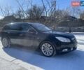 Черный Опель Инсигния, объемом двигателя 2 л и пробегом 277 тыс. км за 9300 $, фото 1 на Automoto.ua