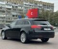 Черный Опель Инсигния, объемом двигателя 2 л и пробегом 309 тыс. км за 8800 $, фото 2 на Automoto.ua