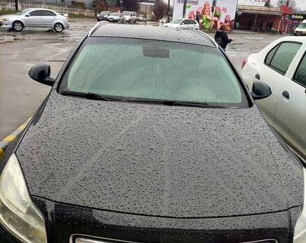 Чорний Опель Інсігнія, об'ємом двигуна 2 л та пробігом 250 тис. км за 7999 $, фото 1 на Automoto.ua