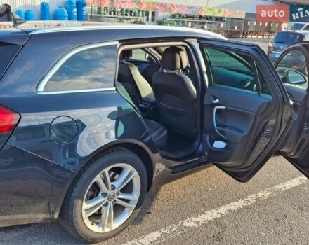 Черный Опель Инсигния, объемом двигателя 1.96 л и пробегом 180 тыс. км за 9900 $, фото 5 на Automoto.ua