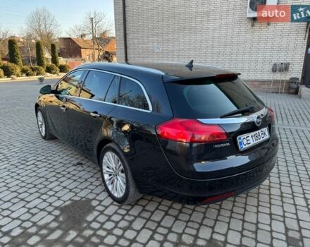 Чорний Опель Інсігнія, об'ємом двигуна 1.96 л та пробігом 209 тис. км за 7600 $, фото 6 на Automoto.ua
