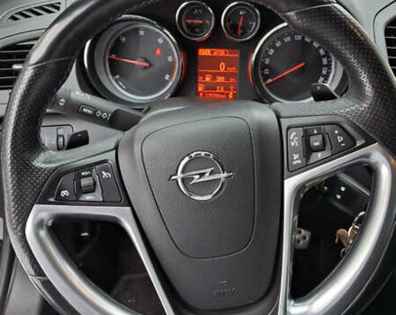 Чорний Опель Інсігнія, об'ємом двигуна 1.96 л та пробігом 176 тис. км за 10950 $, фото 5 на Automoto.ua