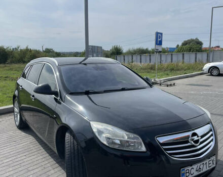 Чорний Опель Інсігнія, об'ємом двигуна 1.96 л та пробігом 256 тис. км за 8175 $, фото 5 на Automoto.ua