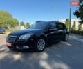 Чорний Опель Інсігнія, об'ємом двигуна 1.6 л та пробігом 191 тис. км за 9000 $, фото 1 на Automoto.ua