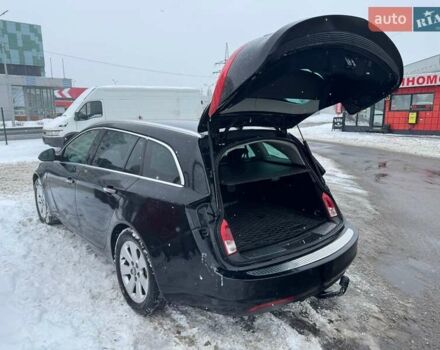 Чорний Опель Інсігнія, об'ємом двигуна 1.96 л та пробігом 252 тис. км за 9200 $, фото 1 на Automoto.ua