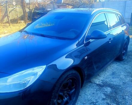 Чорний Опель Інсігнія, об'ємом двигуна 2 л та пробігом 297 тис. км за 7499 $, фото 2 на Automoto.ua