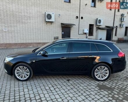 Чорний Опель Інсігнія, об'ємом двигуна 1.96 л та пробігом 209 тис. км за 7600 $, фото 7 на Automoto.ua