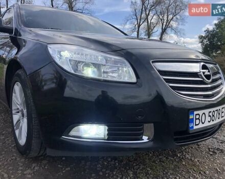 Чорний Опель Інсігнія, об'ємом двигуна 1.96 л та пробігом 370 тис. км за 9000 $, фото 4 на Automoto.ua