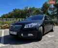 Черный Опель Инсигния, объемом двигателя 2 л и пробегом 232 тыс. км за 8900 $, фото 1 на Automoto.ua