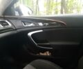 Черный Опель Инсигния, объемом двигателя 2 л и пробегом 280 тыс. км за 9300 $, фото 1 на Automoto.ua