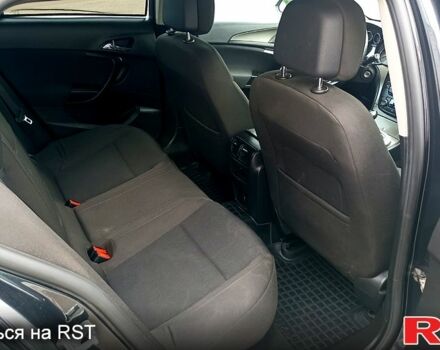 Чорний Опель Інсігнія, об'ємом двигуна 1.4 л та пробігом 192 тис. км за 6000 $, фото 5 на Automoto.ua