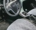 Черный Опель Инсигния, объемом двигателя 1.36 л и пробегом 240 тыс. км за 6700 $, фото 7 на Automoto.ua