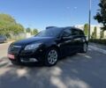 Чорний Опель Інсігнія, об'ємом двигуна 1.6 л та пробігом 191 тис. км за 9053 $, фото 1 на Automoto.ua