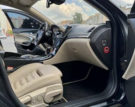 Чорний Опель Інсігнія, об'ємом двигуна 1.96 л та пробігом 237 тис. км за 12000 $, фото 6 на Automoto.ua