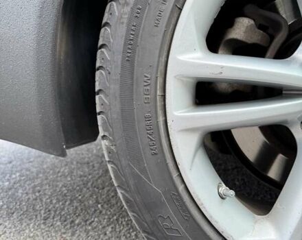 Чорний Опель Інсігнія, об'ємом двигуна 1.96 л та пробігом 237 тис. км за 12000 $, фото 4 на Automoto.ua