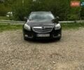 Черный Опель Инсигния, объемом двигателя 2 л и пробегом 317 тыс. км за 9200 $, фото 1 на Automoto.ua