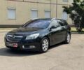 Черный Опель Инсигния, объемом двигателя 2 л и пробегом 199 тыс. км за 8690 $, фото 1 на Automoto.ua