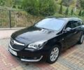 Черный Опель Инсигния, объемом двигателя 2 л и пробегом 322 тыс. км за 11500 $, фото 1 на Automoto.ua