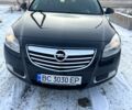 Черный Опель Инсигния, объемом двигателя 2 л и пробегом 258 тыс. км за 7750 $, фото 1 на Automoto.ua