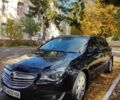 Черный Опель Инсигния, объемом двигателя 1.96 л и пробегом 300 тыс. км за 7800 $, фото 1 на Automoto.ua
