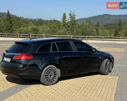 Черный Опель Инсигния, объемом двигателя 2 л и пробегом 299 тыс. км за 7799 $, фото 3 на Automoto.ua