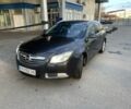 Чорний Опель Інсігнія, об'ємом двигуна 2 л та пробігом 300 тис. км за 7700 $, фото 1 на Automoto.ua