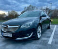 Черный Опель Инсигния, объемом двигателя 2 л и пробегом 243 тыс. км за 12500 $, фото 1 на Automoto.ua