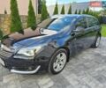 Чорний Опель Інсігнія, об'ємом двигуна 2 л та пробігом 267 тис. км за 8500 $, фото 1 на Automoto.ua
