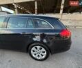 Черный Опель Инсигния, объемом двигателя 2 л и пробегом 210 тыс. км за 9000 $, фото 5 на Automoto.ua