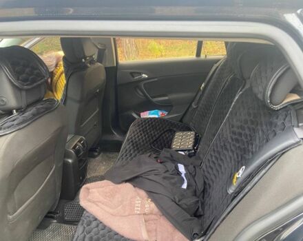 Черный Опель Инсигния, объемом двигателя 2 л и пробегом 270 тыс. км за 8800 $, фото 7 на Automoto.ua