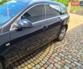 Чорний Опель Інсігнія, об'ємом двигуна 2 л та пробігом 201 тис. км за 9100 $, фото 5 на Automoto.ua