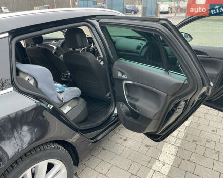 Черный Опель Инсигния, объемом двигателя 2 л и пробегом 180 тыс. км за 9400 $, фото 74 на Automoto.ua