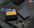Чорний Опель Інсігнія, об'ємом двигуна 2 л та пробігом 380 тис. км за 5300 $, фото 4 на Automoto.ua