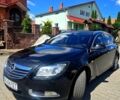 Чорний Опель Інсігнія, об'ємом двигуна 2 л та пробігом 270 тис. км за 8500 $, фото 1 на Automoto.ua