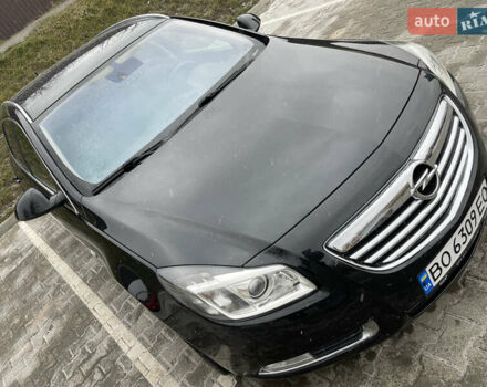 Черный Опель Инсигния, объемом двигателя 2 л и пробегом 180 тыс. км за 9400 $, фото 1 на Automoto.ua