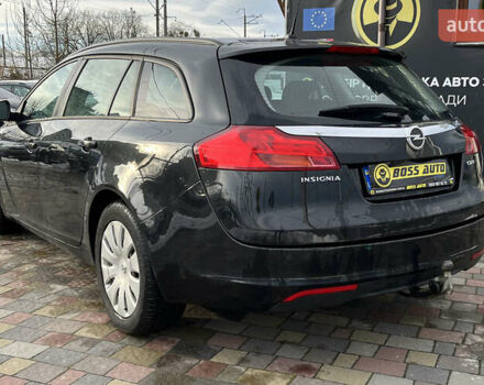 Чорний Опель Інсігнія, об'ємом двигуна 1.96 л та пробігом 244 тис. км за 8100 $, фото 4 на Automoto.ua