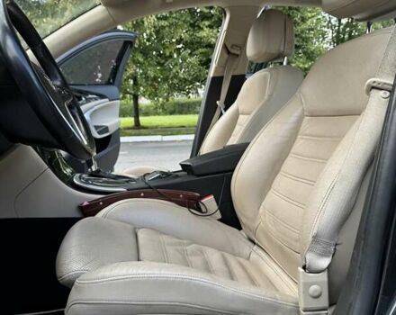 Чорний Опель Інсігнія, об'ємом двигуна 1.96 л та пробігом 237 тис. км за 12000 $, фото 19 на Automoto.ua