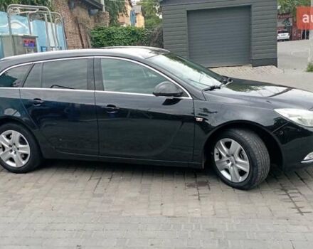 Чорний Опель Інсігнія, об'ємом двигуна 1.96 л та пробігом 234 тис. км за 8800 $, фото 12 на Automoto.ua