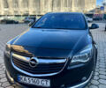 Черный Опель Инсигния, объемом двигателя 2 л и пробегом 250 тыс. км за 9800 $, фото 1 на Automoto.ua