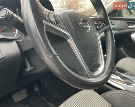 Черный Опель Инсигния, объемом двигателя 2 л и пробегом 180 тыс. км за 9400 $, фото 115 на Automoto.ua