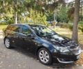 Черный Опель Инсигния, объемом двигателя 1.96 л и пробегом 300 тыс. км за 7800 $, фото 1 на Automoto.ua