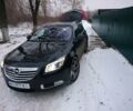 Черный Опель Инсигния, объемом двигателя 2 л и пробегом 158 тыс. км за 11000 $, фото 1 на Automoto.ua