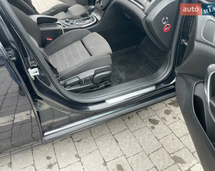 Черный Опель Инсигния, объемом двигателя 2 л и пробегом 180 тыс. км за 9400 $, фото 64 на Automoto.ua