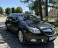 Чорний Опель Інсігнія, об'ємом двигуна 2 л та пробігом 282 тис. км за 8497 $, фото 1 на Automoto.ua