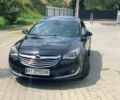 Черный Опель Инсигния, объемом двигателя 2 л и пробегом 140 тыс. км за 13500 $, фото 1 на Automoto.ua