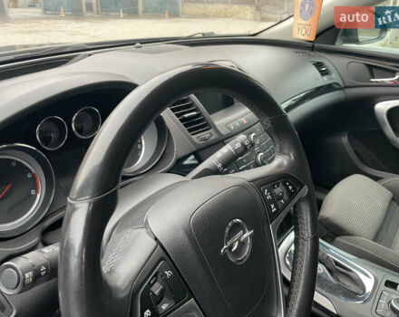 Черный Опель Инсигния, объемом двигателя 2 л и пробегом 180 тыс. км за 9400 $, фото 116 на Automoto.ua
