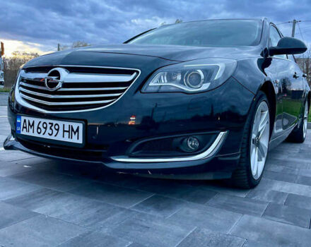 Черный Опель Инсигния, объемом двигателя 2 л и пробегом 243 тыс. км за 12500 $, фото 2 на Automoto.ua